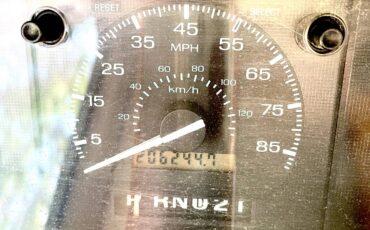 Ford-e150-conversion-van-1996-green-13