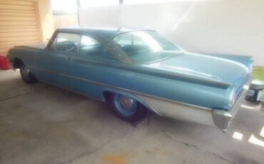 Ford-galaxie-starliner-1961-green-4
