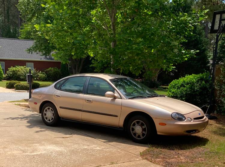 Ford-taurus-gl-1996-yellow-1