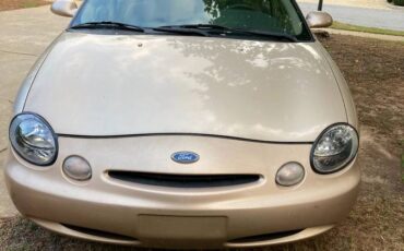 Ford-taurus-gl-1996-yellow