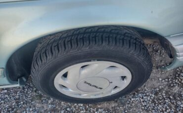 Ford-taurus-station-wagon-1995-green-1