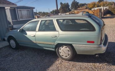 Ford-taurus-station-wagon-1995-green-11
