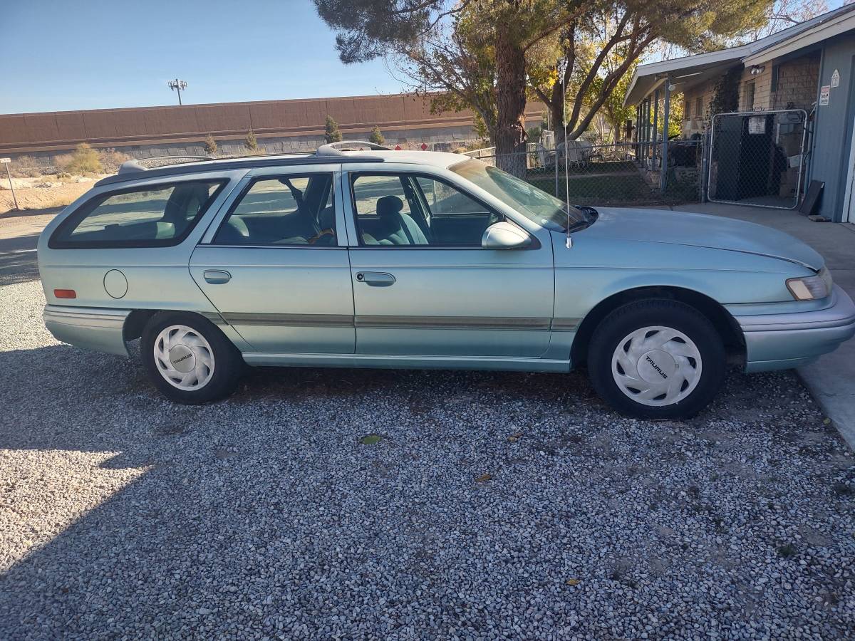 Ford-taurus-station-wagon-1995-green-13