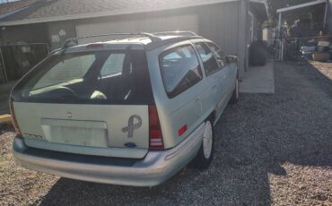 Ford-taurus-station-wagon-1995-green-2