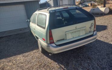 Ford-taurus-station-wagon-1995-green-3