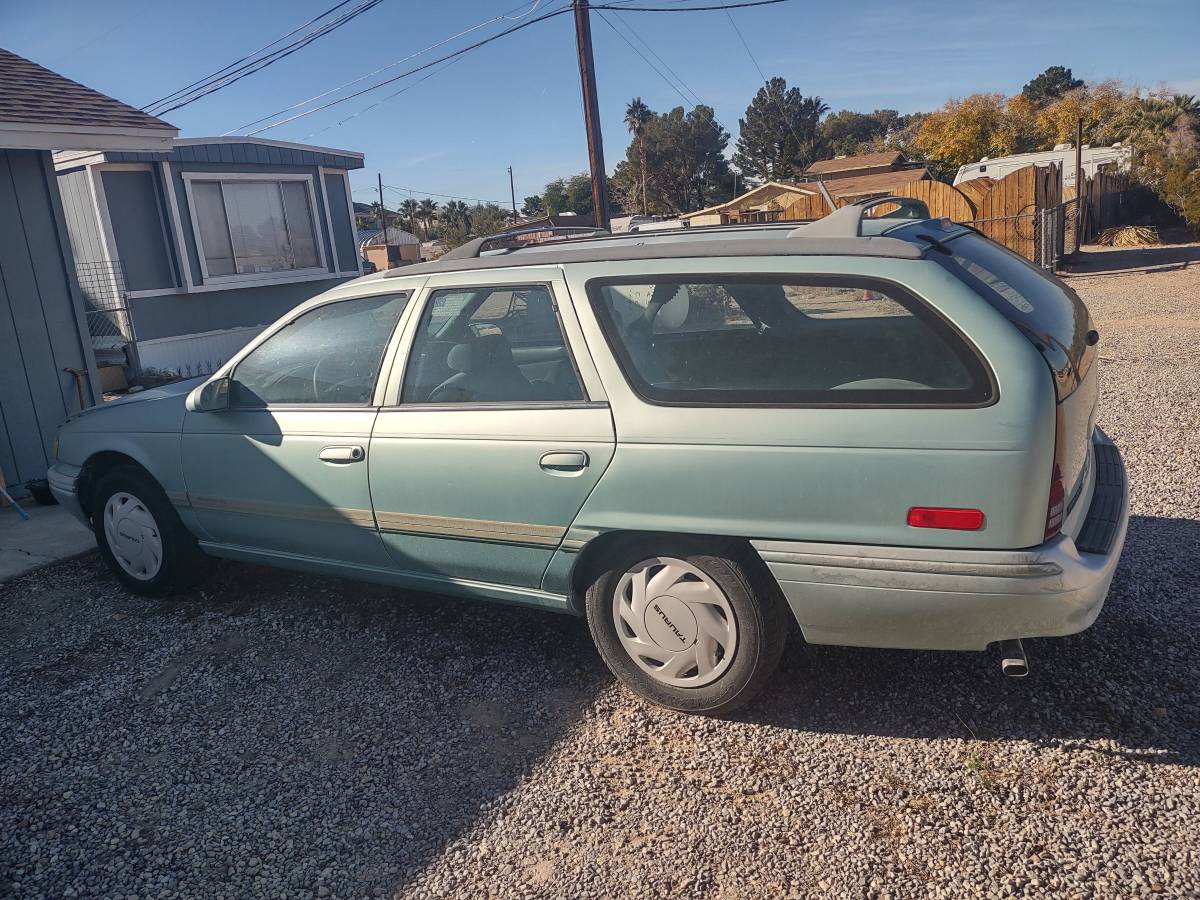 Ford-taurus-station-wagon-1995-green-4