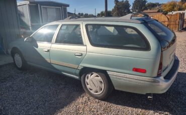 Ford-taurus-station-wagon-1995-green-5