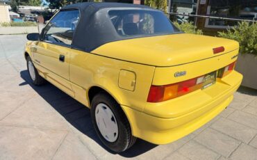 Geo-metro-convertible-1991-yellow-13