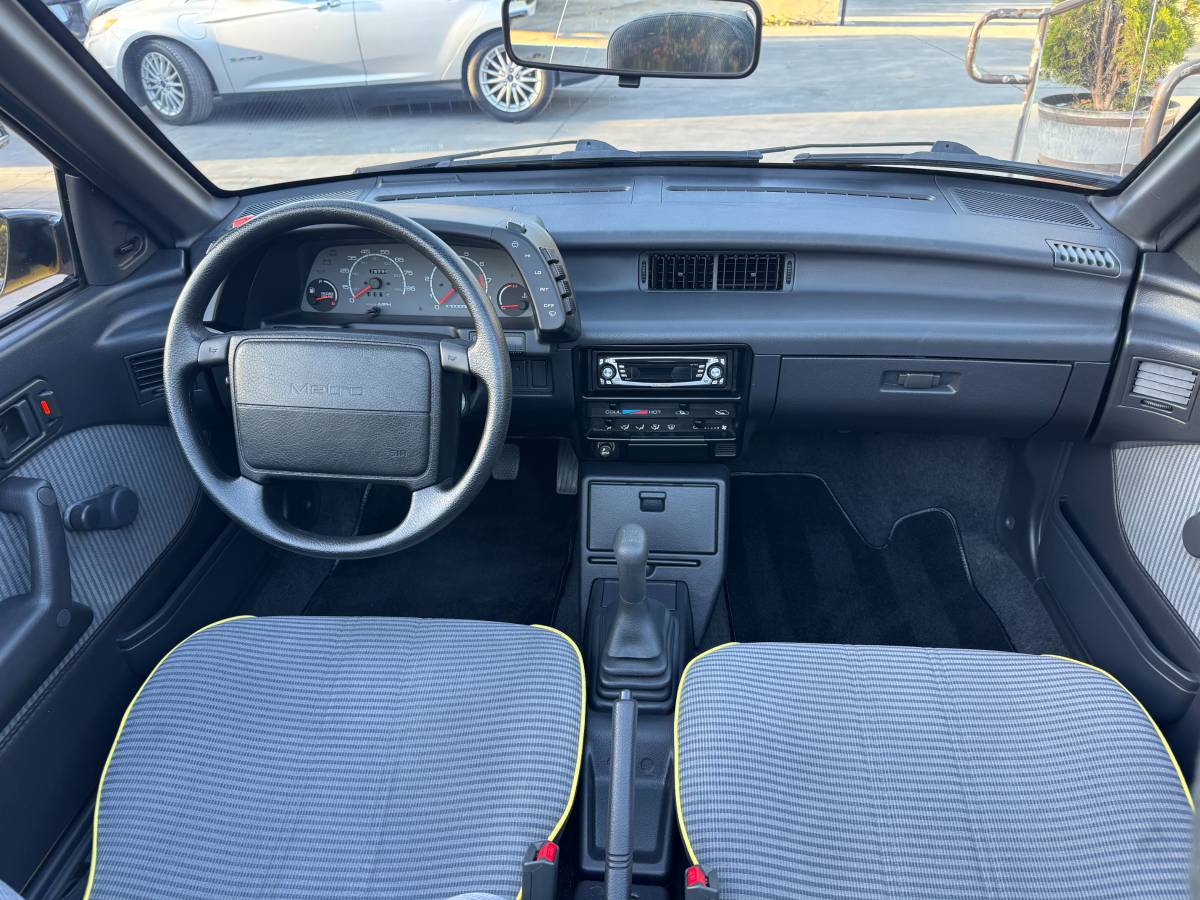 Geo-metro-convertible-1991-yellow-16