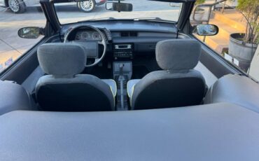 Geo-metro-convertible-1991-yellow-17