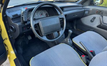 Geo-metro-convertible-1991-yellow-2