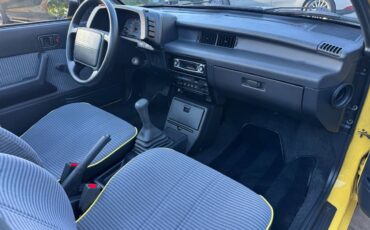 Geo-metro-convertible-1991-yellow-3