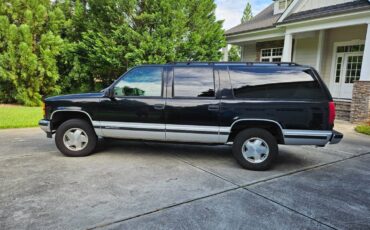 Gmc-suburban-1500-1996-black-1