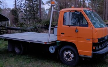 Isuzu-npr-flatbed-diesel-1995-orange