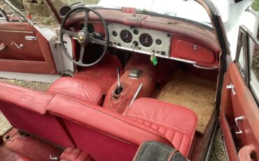 Jaguar-Xk150-1960-Olde-English-White-Red-11