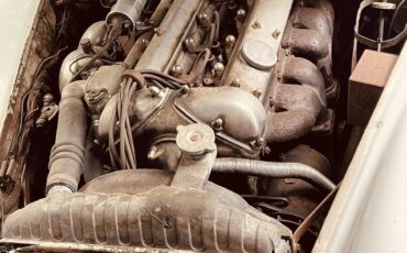 Jaguar-Xk150-1960-Olde-English-White-Red-4