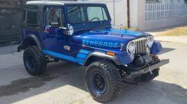 Jeep-cj-7-open-body-with-extra-duty-suspension-1983-blue-3