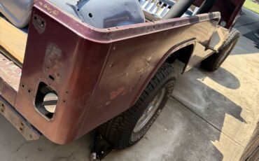 Jeep-cj-8-scrambler-open-body-with-extra-duty-susp-1981-red-1
