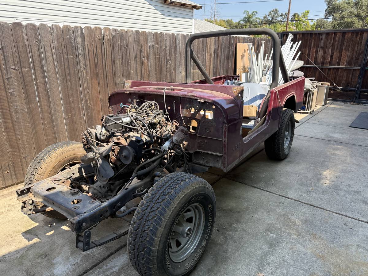 Jeep-cj-8-scrambler-open-body-with-extra-duty-susp-1981-red-5