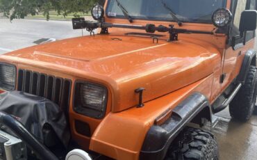 Jeep-wrangler-sport-1987-orange-1