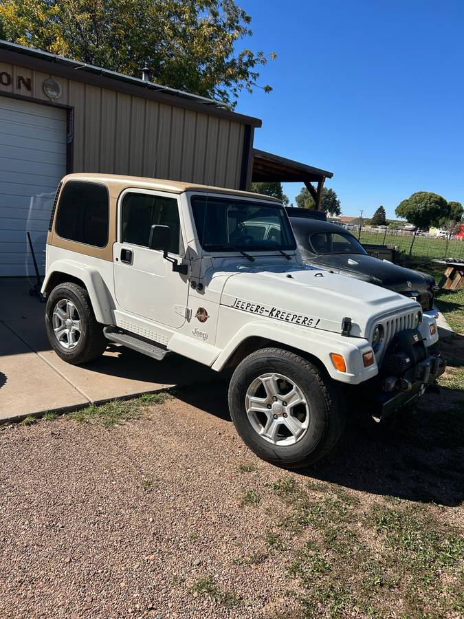 Jeep-wrangler-unlimited-sahara-1997-white-7