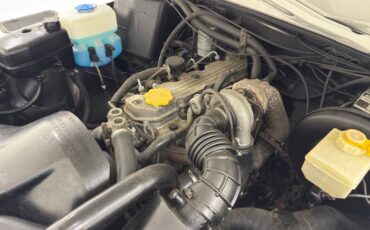 Land-rover-Defender-90-1991-Alpinweiss-Charcoal-Black-3