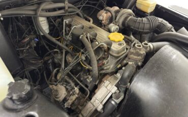 Land-rover-Defender-90-1991-Alpinweiss-Charcoal-Black-42