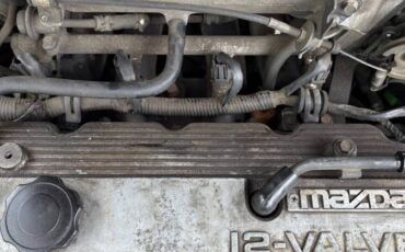 Mazda-626-1990-white-21