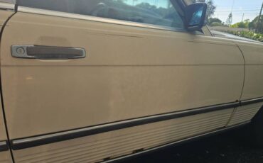 Mercedes-300sl-1986-yellow-1