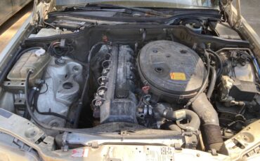 Mercedes-benz-300se-1989-brown-11
