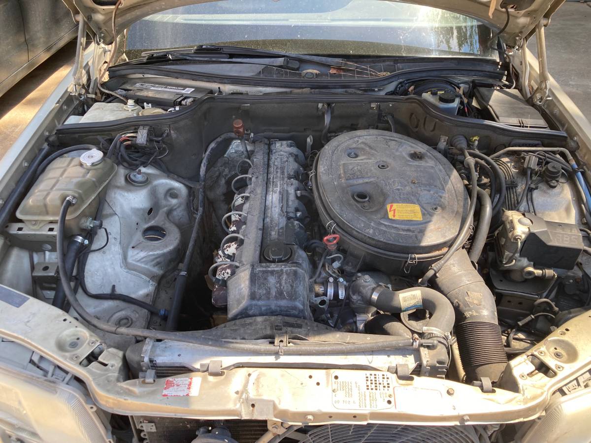 Mercedes-benz-300se-1989-brown-11