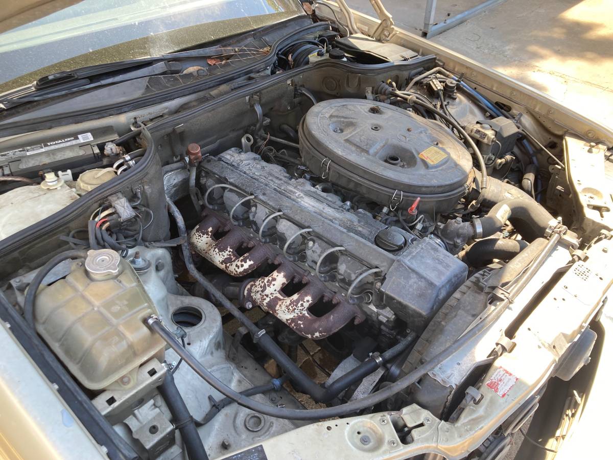 Mercedes-benz-300se-1989-brown-14