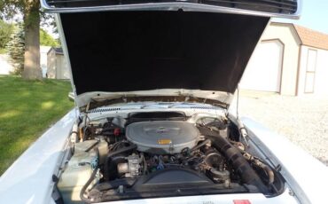 Mercedes-benz-560-sl-1986-white-13