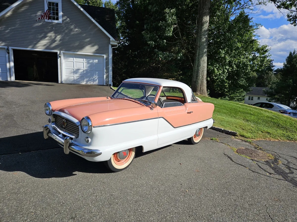 Metropolitan-562-1957-Coral-And-White-Gray