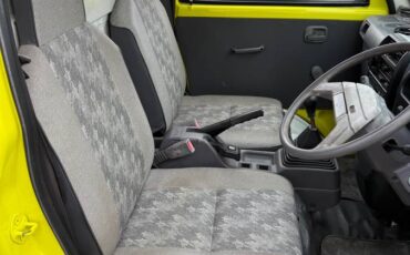Mitsubishi-minicab-1994-yellow-16