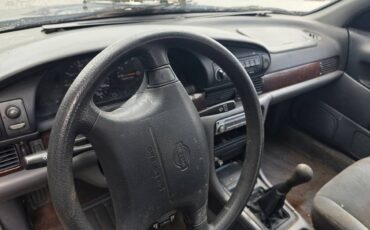 Nissan-altima-1996-green-14