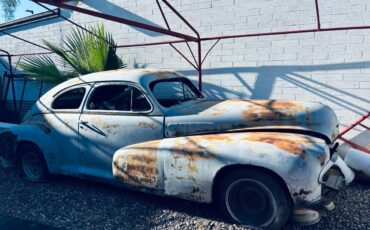 Olds-custom-cruiser-98-2-dr-1942-1