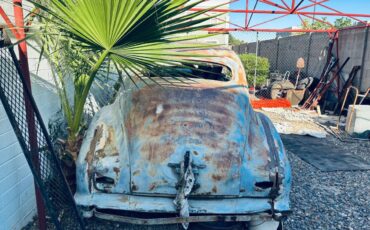 Olds-custom-cruiser-98-2-dr-1942-3