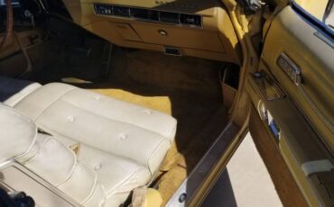 Olds-toronado-1973-yellow-10