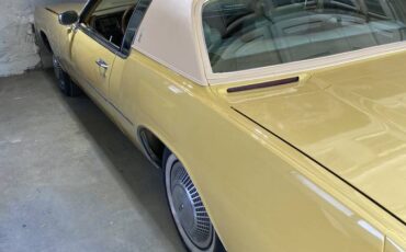 Olds-toronado-1973-yellow-8