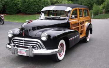 Oldsmobile-66-1947-Black-Brown-14