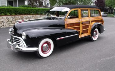 Oldsmobile-66-1947-Black-Brown-2