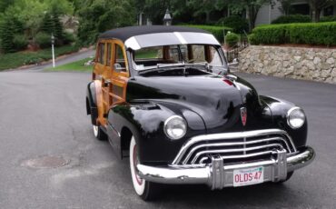 Oldsmobile-66-1947-Black-Brown