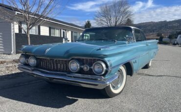 Oldsmobile-88-1959-Turquoise-Black-And-White-1