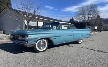 Oldsmobile-88-1959-Turquoise-Black-And-White