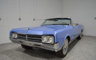 Oldsmobile-Starfire-1965-Ice-Blue-Metallic-BlueWhite