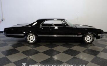 Oldsmobile-Starfire-1966-Black-Black-and-White-10