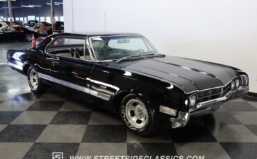 Oldsmobile-Starfire-1966-Black-Black-and-White-11