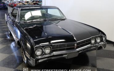 Oldsmobile-Starfire-1966-Black-Black-and-White-12