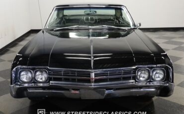 Oldsmobile-Starfire-1966-Black-Black-and-White-13